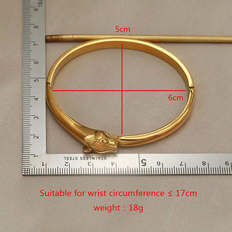 Serpentii 18k gold bangle